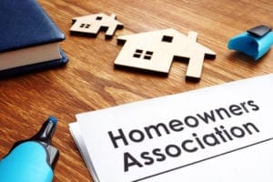 Documents about Homeowners Association HOA on a desk.